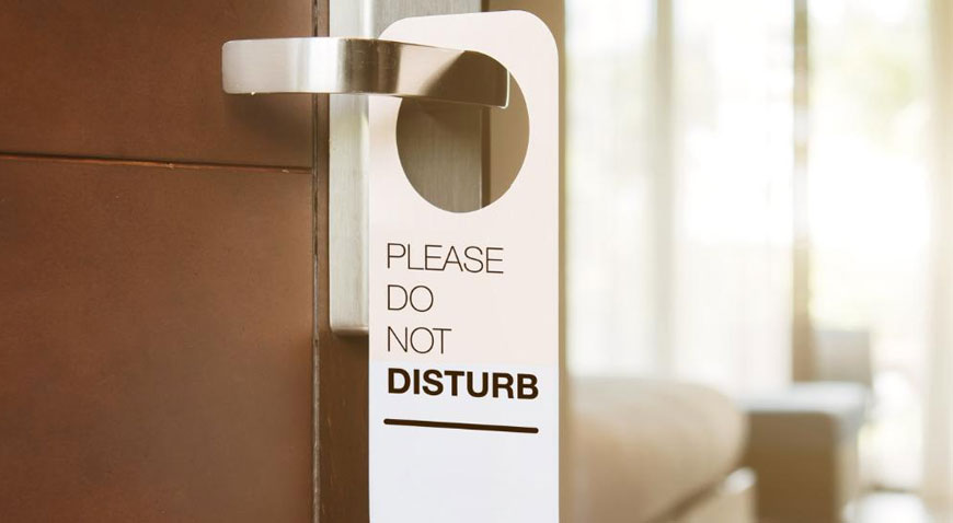 Why Hotel ‘Do Not Disturb’ Signs Are Disappearing